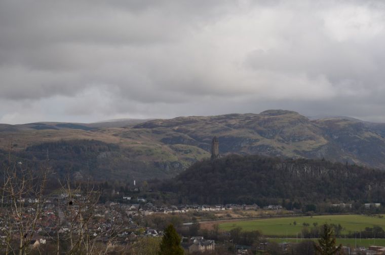Scottish countryside with view of the Wallace monument from Stirling castle