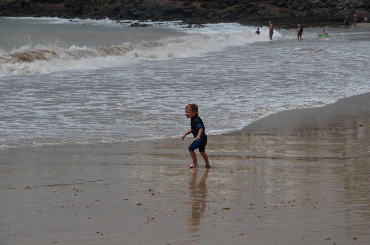 Marcus playing on the beach